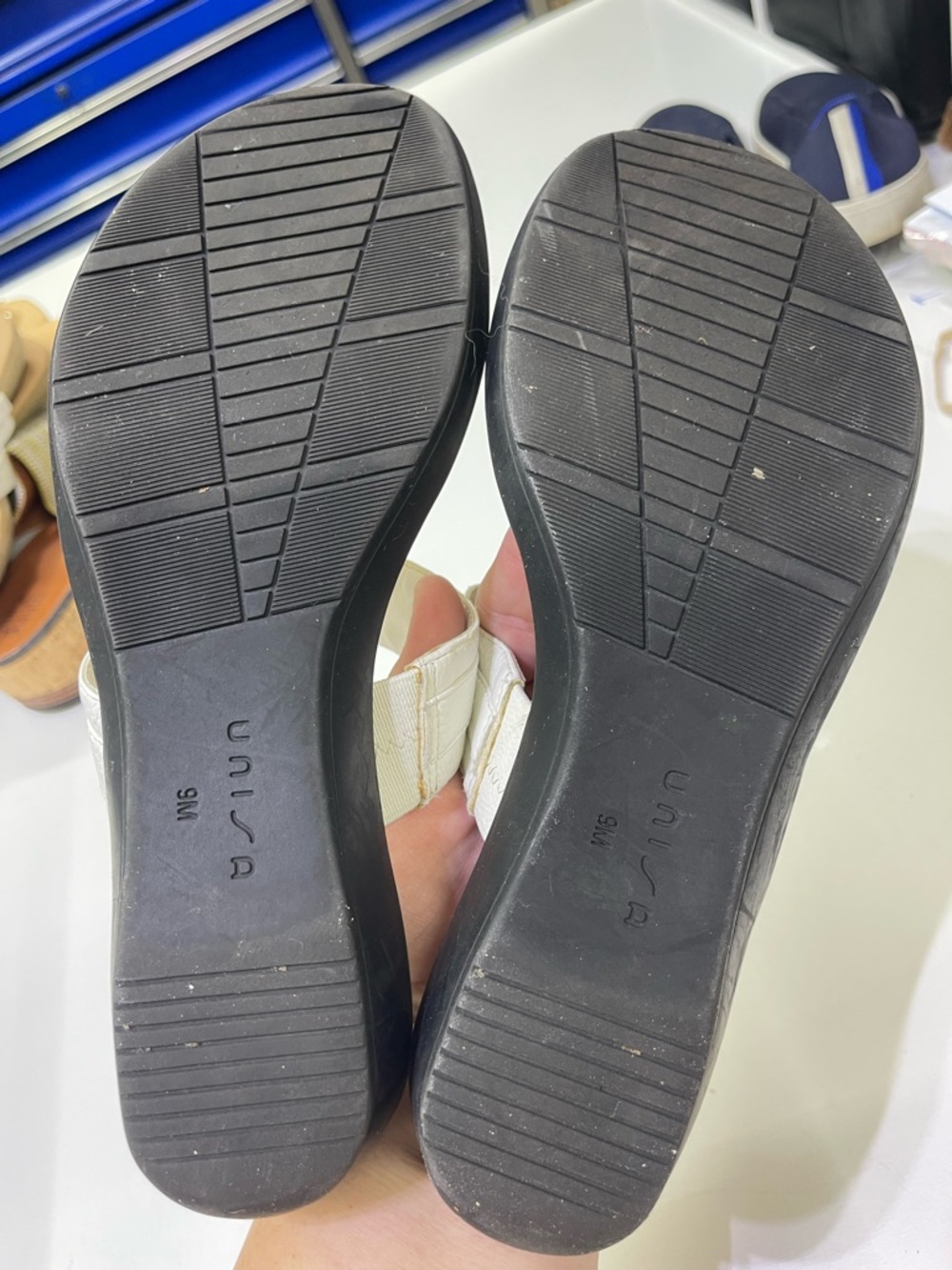 Unisa brand white mules featuring a gold-tone metal detail. - Picture 6 of 6